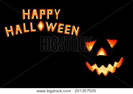 HappyHalloween pumpkin with scary face on black backgound