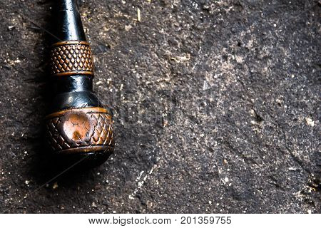 Old screw driver on the cement floor