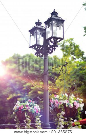 The Pillar with flower buckets and flare