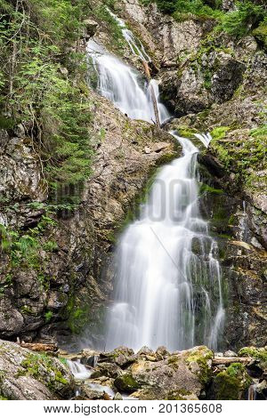 Waterfall in foresst - Kmetov vodopad in High tatras mountains Slovakia