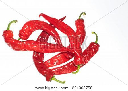 red chili or chilli cayenne pepper isolated on white background cutout