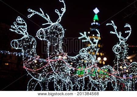 Lighting Decoration Deers With Christmas Tree On The Background In The City Of Gomel During New Year