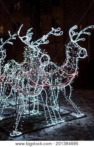 Lighting Decoration Deers With Christmas Tree On The Background In The City Of Gomel During New Year