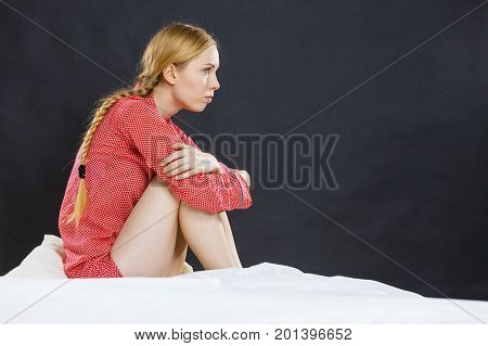 Sad Depressed Young Woman In Bed