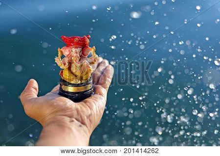 Lord Ganesha on hand , Ganesh Festival