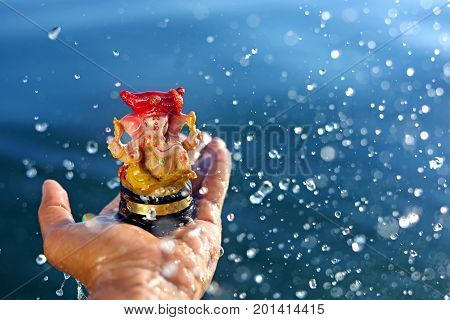 Lord Ganesha on hand , Ganesh Festival