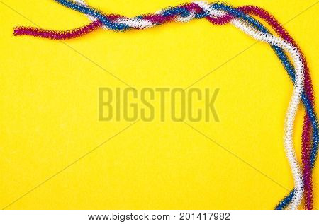 blue pink white rope on a yellow background