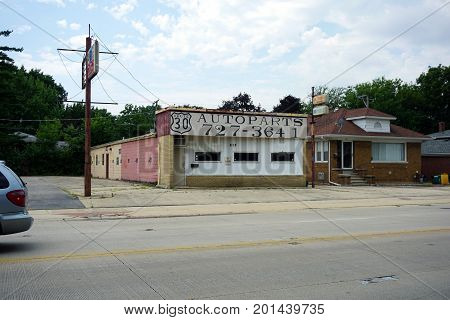 JOLIET, ILLINOIS / UNITED STATES - JULY 20, 2017: The Route 30 Auto Parts Store sits vacant on Plainfield Road.