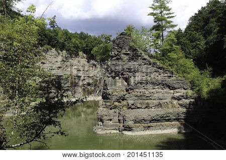 Rock outcropping in the bend of the Genesee river. Letchworth State Park in New Yorl