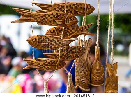 Garland handmade wooden carved fish figure weathered natural texture