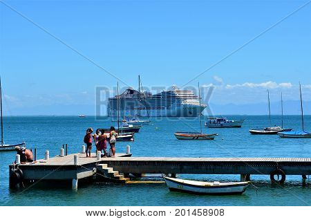 Buzios, Brazil, February 24, 2013: Transatlantic MSC Fantasia anchored. Every year the city receives thousands of tourist during the cruise season in Brazil.