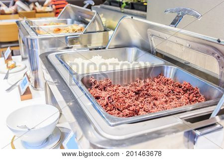 Cuisine Culinary Buffet Dinner Catering Dining Food Celebration Party Concept. Different variety of food in all you can eat catering buffet food indoor in luxury restaurant with meat and vegetables