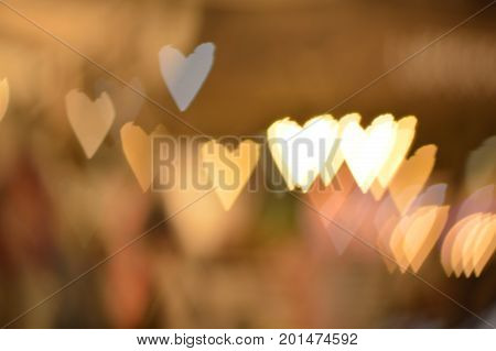 blur background with warm tone hearts bokeh