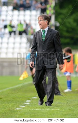KAPOSVAR, HUNGARY - APRIL 27: Laszlo Prukner (Ferencvaros trainer) in action at a Hungarian National Championship soccer game - Kaposvar vs Ferencvaros on April 27, 2011 in Kaposvar, Hungary.