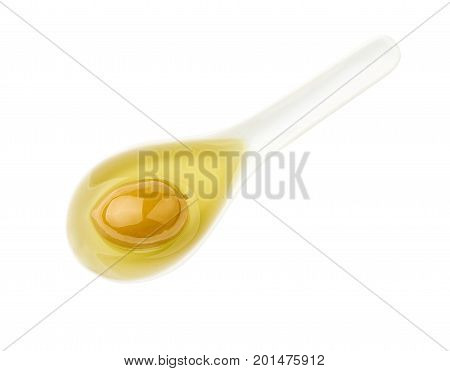 Olive and olive oil in white spoon on white background with clipping path.