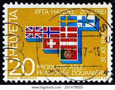 SWITZERLAND - CIRCA 1967: A stamp printed in Switzerland shows flags of European Free Trade Area countries, circa 1967.