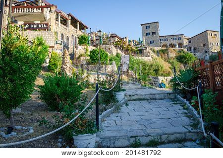 ULCINJ, MONTENEGRO - AUGUST 1, 2017: Restaurants in the Ulcinj old city - Stari Grad