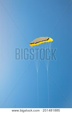 kitesurfing against the blue sky. active rest in the journey.