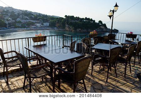 Cafe with beautiful sea view serving the local cuisine. Cozy bar restaurant at the old town of Ulcinj, Montenegro.