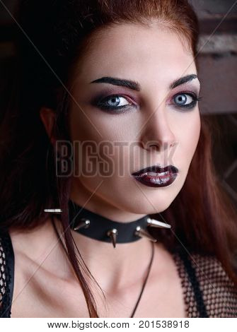 Close-up portrait of the lovely young goth girl