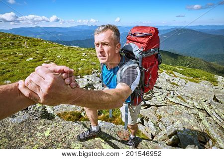 Hand of Help support and help in a dangerous situation.