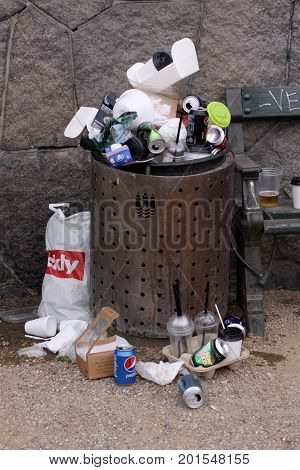 Overfull garbage can in city, Copenhagen August 26, 2017