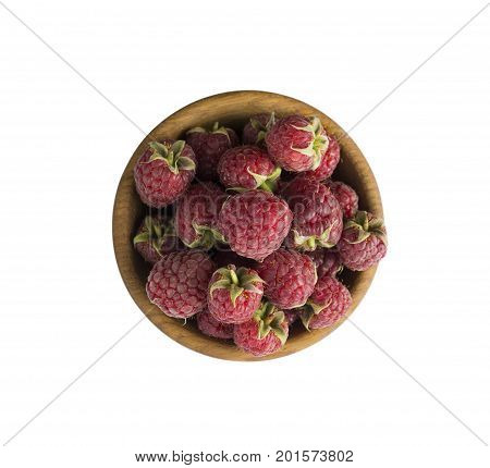 Raspberries in a wooden bowl isolated on white background. Raspberry close-up. Vegetarian or healthy eating. Juicy and delicious raspberries