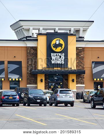 PLATTSBURGH USA - AUGUST 23 2017 : Buffalo Wild Wings restaurant and logo. Buffalo Wild Wings is an American casual dining restaurant and sports bar franchise