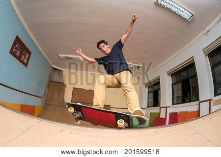 Skateboarder Performing A Trick