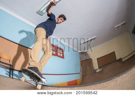 Skateboarder Performing A Trick