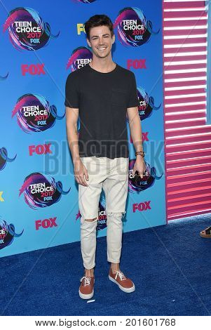 LOS ANGELES - AUG 13:  Grant Gustin arrives for the Teen Choice Awards 2017 on August 13, 2017 in Los Angeles, CA