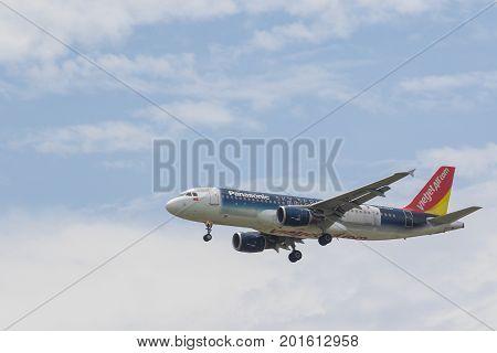 BANGKOK THAILAND - JUNE152017 : vietjet air plane approaching for landing to suvarnabhumi airport vietjet air is the first one of citizen business airline of vietnamese