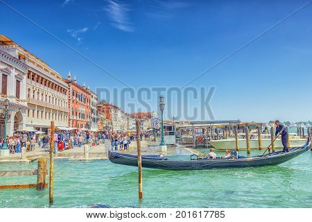 Venice, Italy - May 12, 2017 : Embankment Of The Grand Canal With Gondolas . Italy.