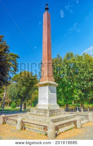 Obelisk On  Piazza Bucarest In Park  Near Villa Medici In Rome. Italy.
