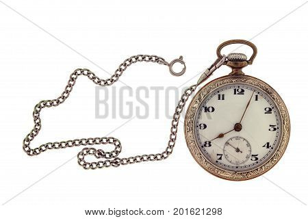 Vintage antique pocket watch with chain isolated on a white background.