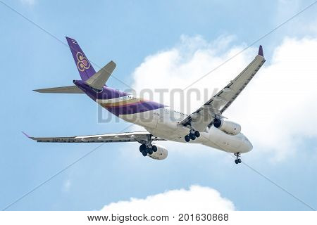 Bangkok, Thailand. - July 24, 2017 : Plane or aircraft of Thai Airways or Airlines on the sky landing to Suvanabhumi airport.