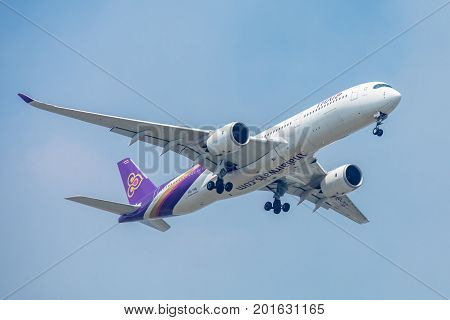 Bangkok, Thailand. - July 24, 2017 : Plane or aircraft of Thai Airways or Airlines on the sky landing to Suvanabhumi airport.