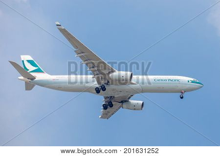 Bangkok, Thailand. - April 23, 2017 : Plane or aircraft of Cathy Pacific Airlines or Airways on the sky landing to Suvanabhumi airport.