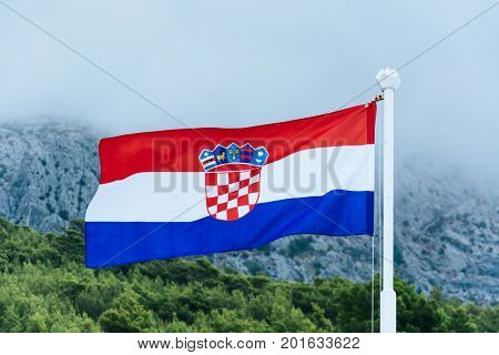 Flag of Croatia on a mountain background
