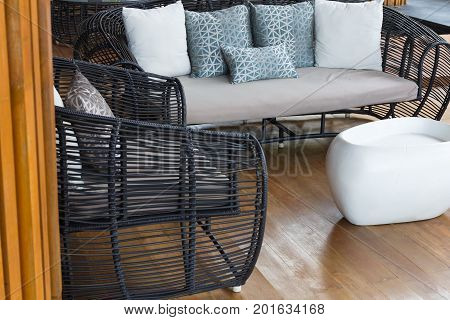 Modern furniture sofa set on wood floor background.