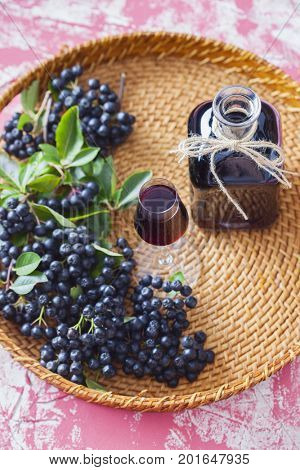 homemade chokeberry juice or liqueur - food and drink