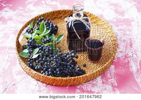 homemade chokeberry juice or liqueur - food and drink