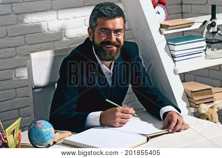 Man With Beard On White Brick Wall Background