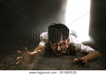 Scary Asian Zombie Man With Blood Crawling