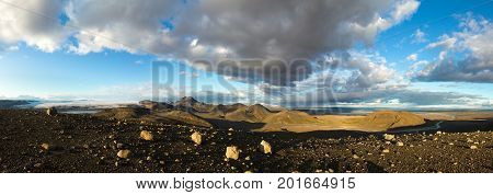 Dramatic panoramic landscape with mountains, glacier and lake in the icelandic highland. Sunset in Iceland.