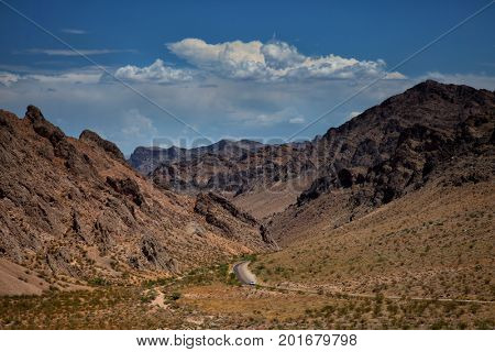 Landscape into Valley of fire in Nevada with mountains in background