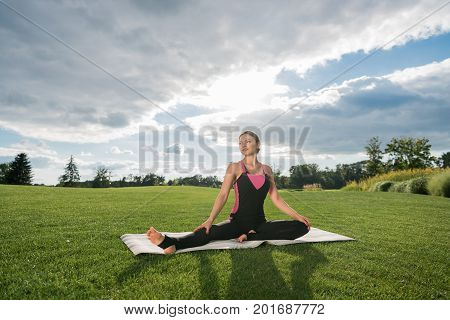 Smiling Woman Performing Yoga