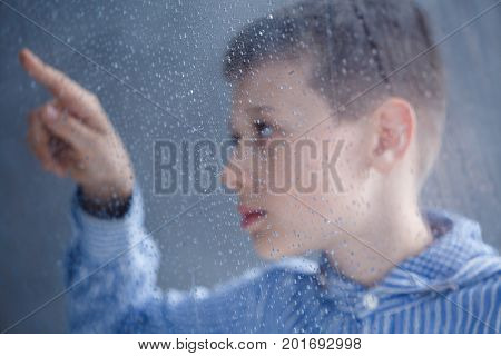 Child Is Looking On Water