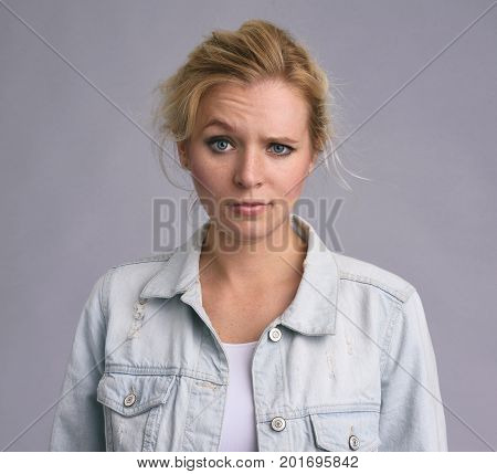 Serious Beautiful Woman Raising An Eyebrow