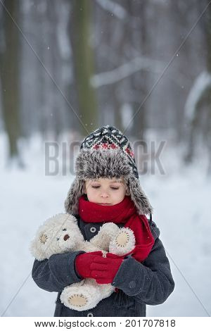 Sad Lost Child, Boy In A Forest With Teddy Bear, Wintertime